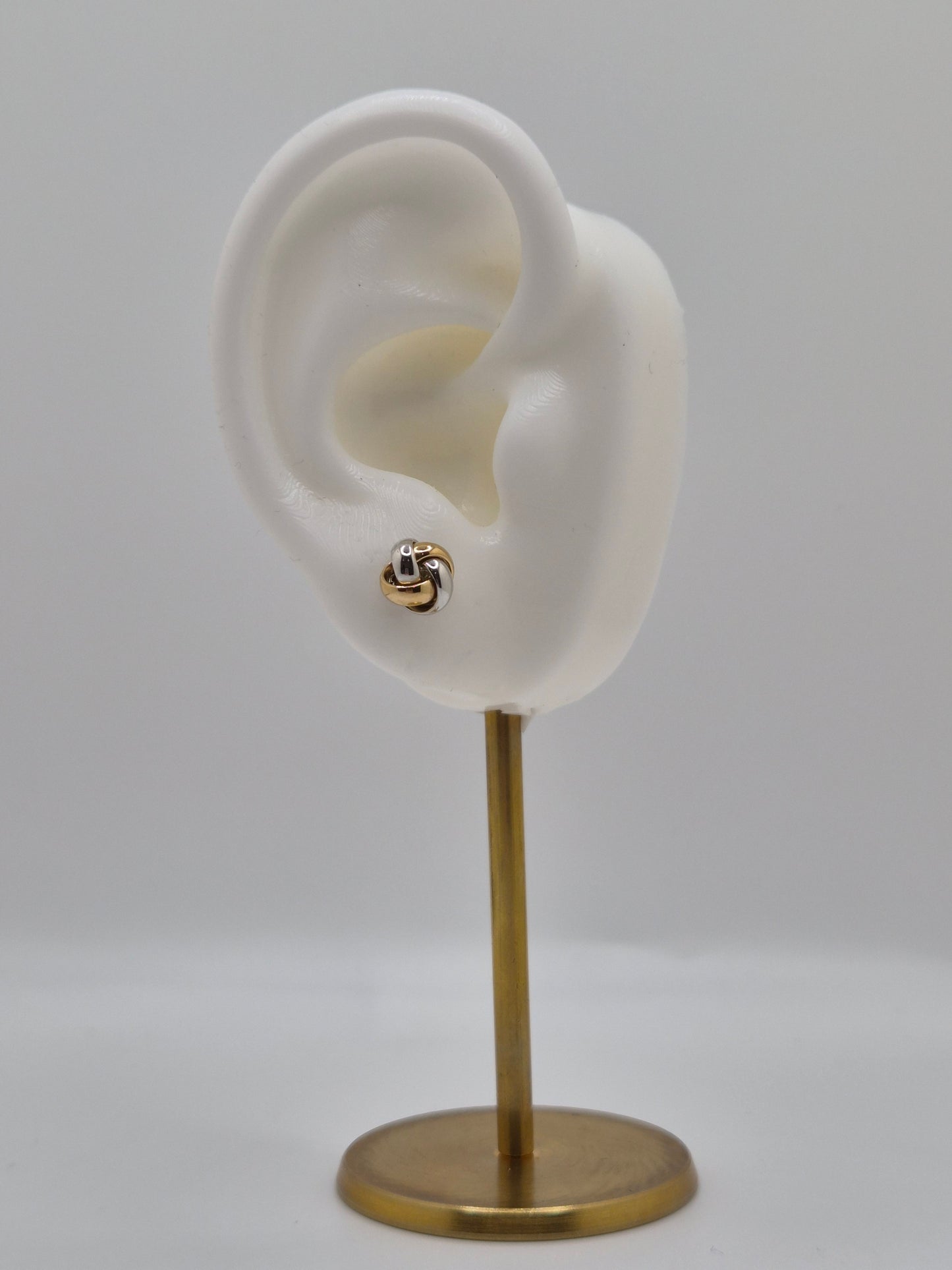 Pendientes de nudo de amor de dos tonos de oro macizo de 14 quilates