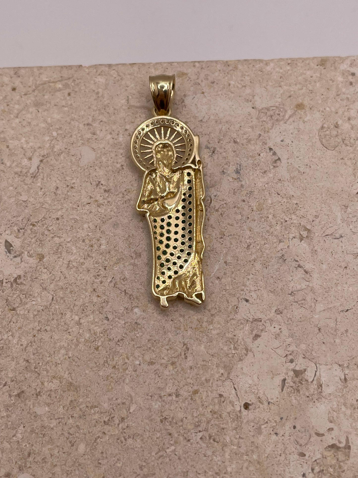 Back view of 14K yellow gold San Judas pendant with smooth polished finish