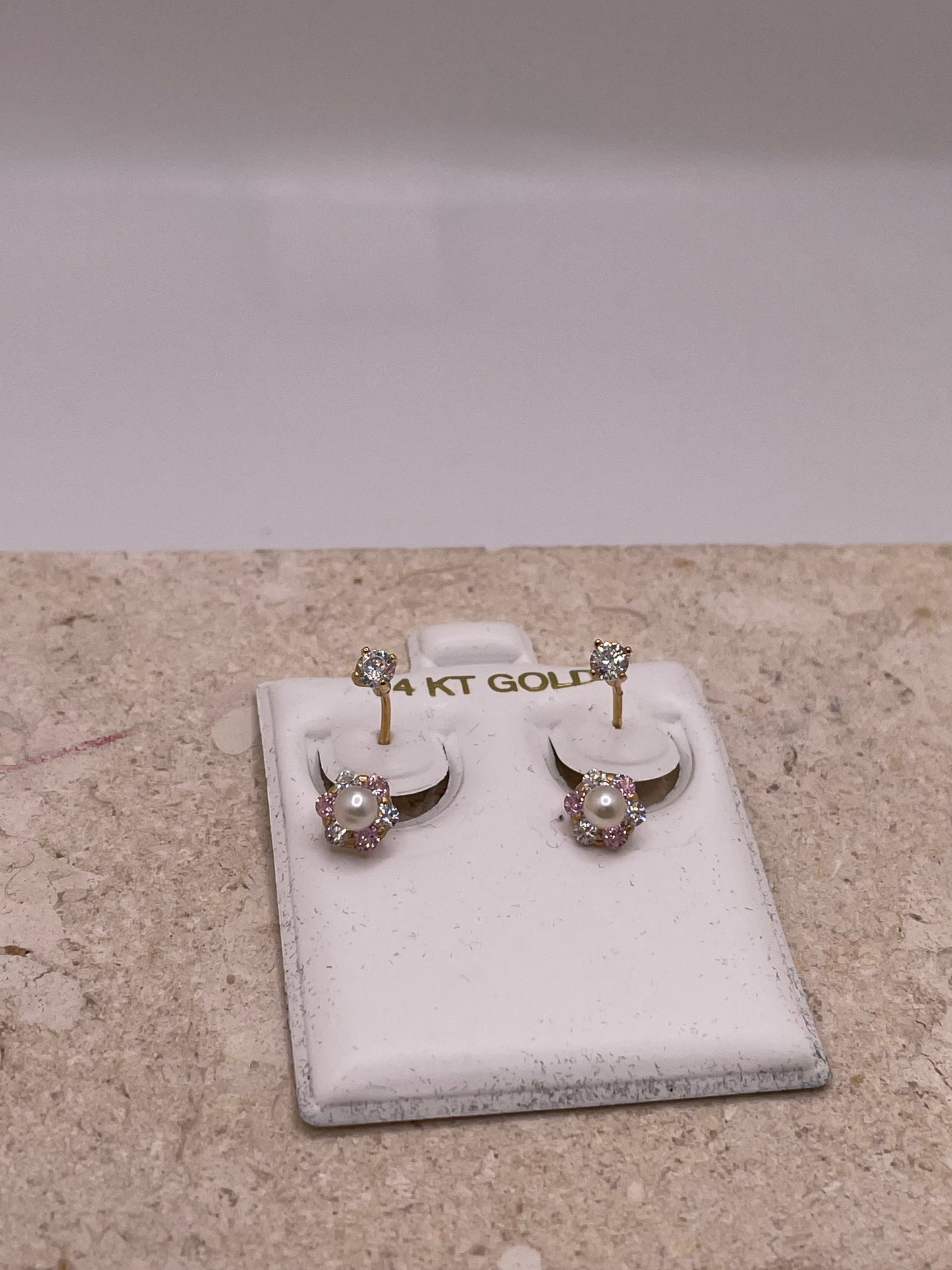 14k gold telephone earrings with cz flower