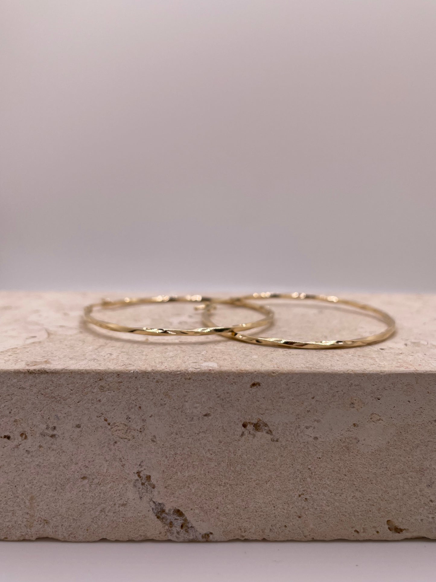 14k gold 1.5mm curled hoop earrings