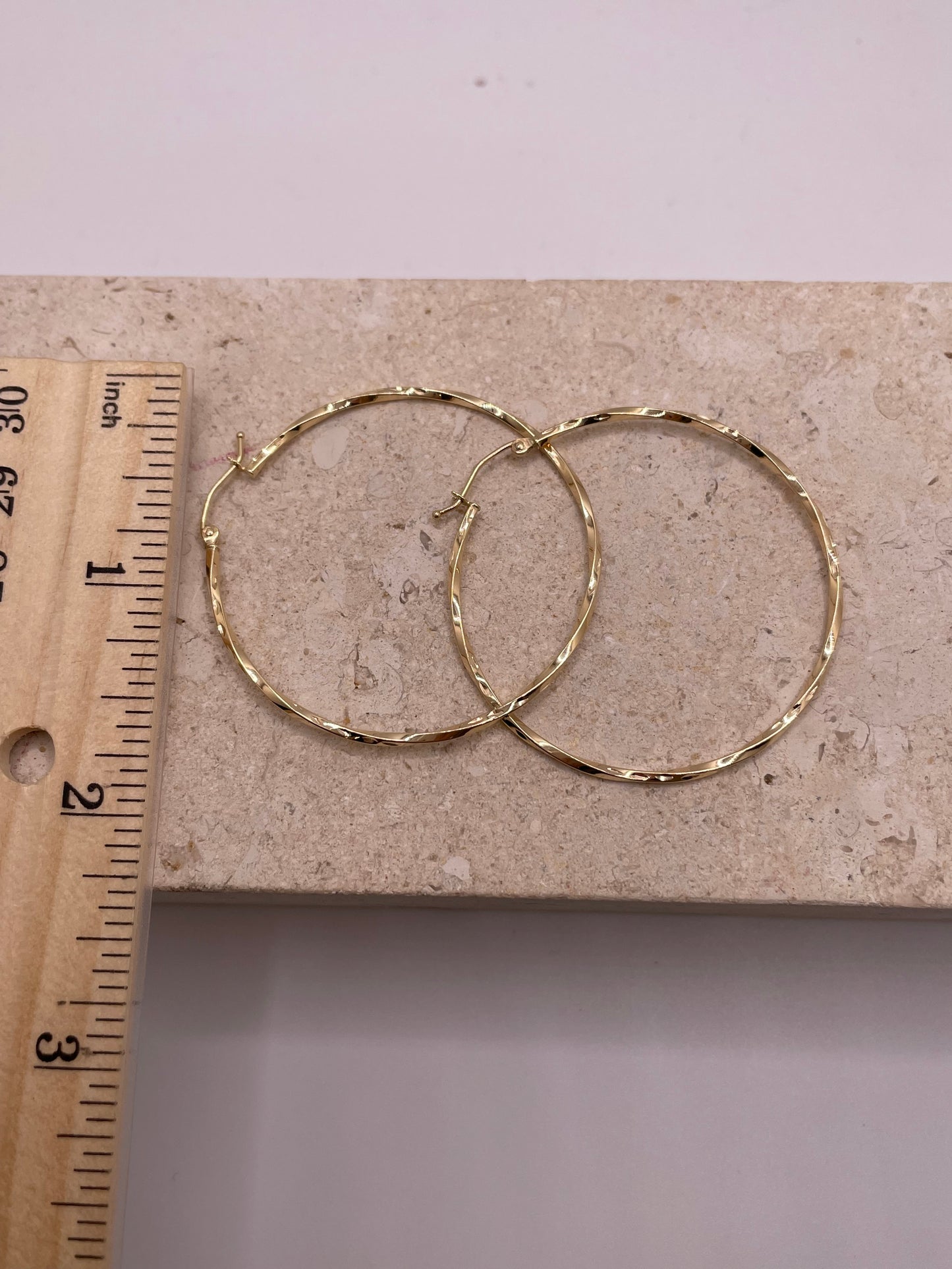 14k gold 1.5mm curled hoop earrings