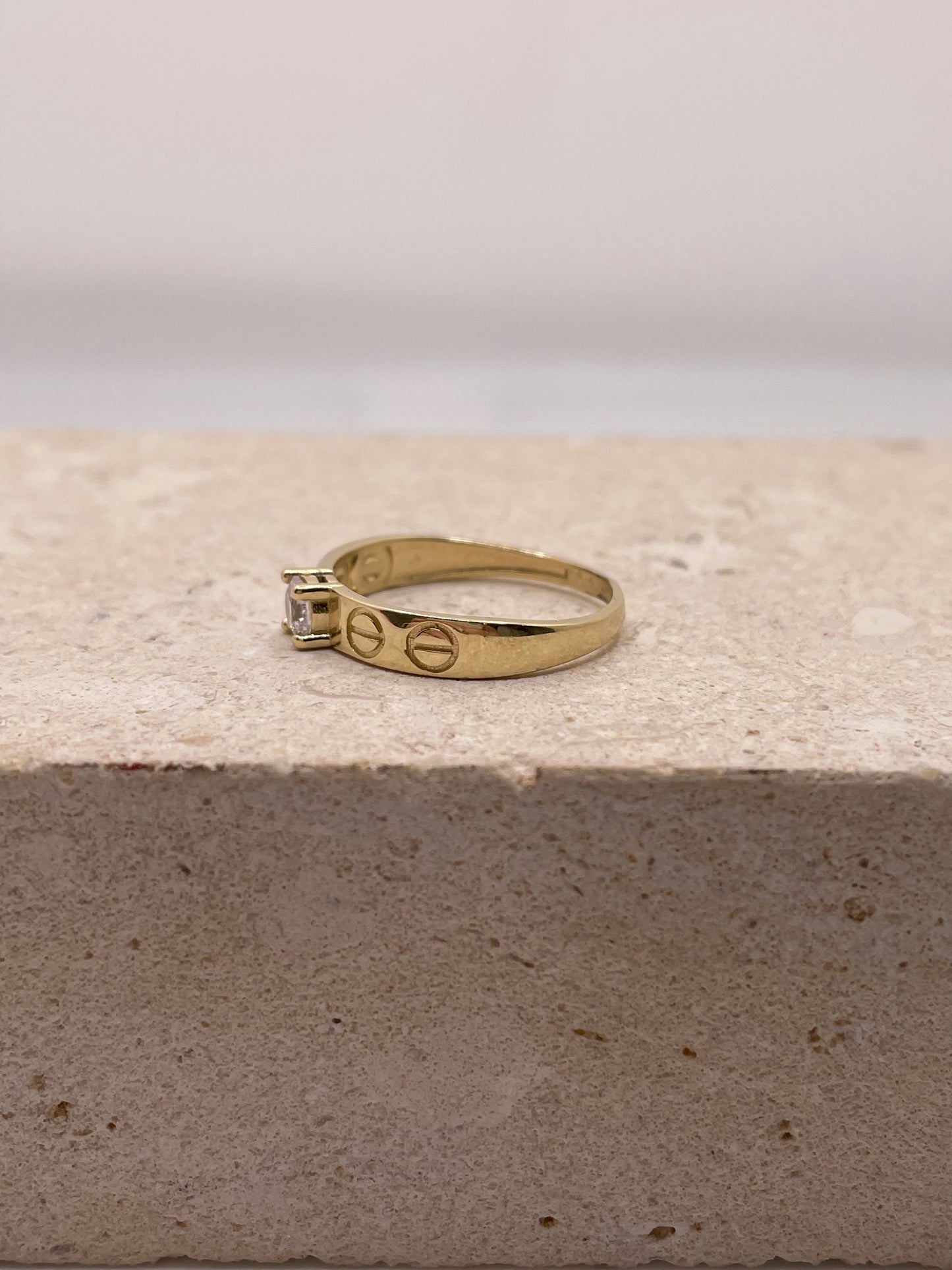 14k gold love-inspired ring with cz