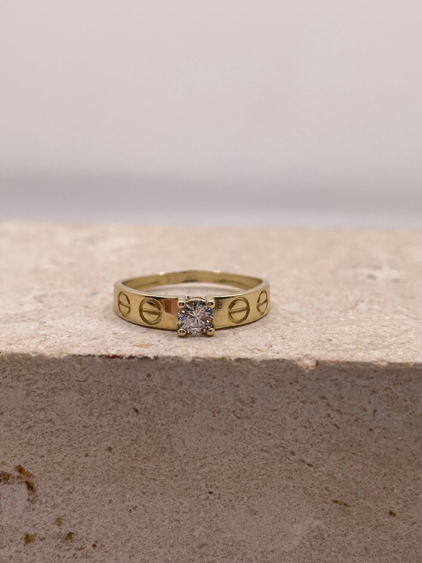 14k gold love-inspired ring with cz