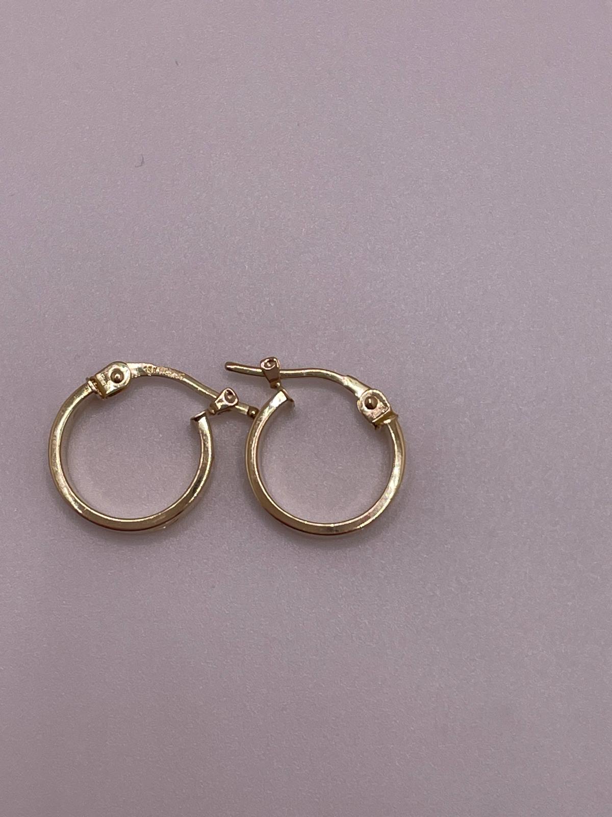 14k gold small love-inspired hoop earrings