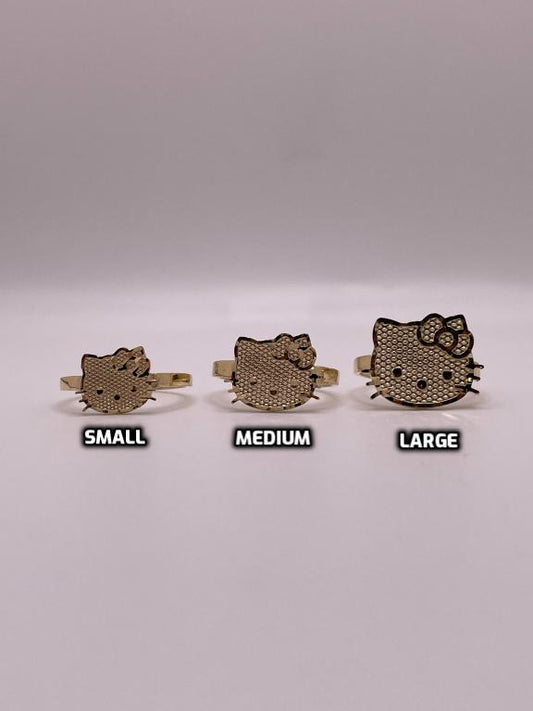14K gold Hello Kitty face ring | real gold Hello Kitty jewelry | kawaii Hello Kitty ring small medium large | 14k yellow gold Sanrio ring | Hello Kitty collectors jewelry | matching Hello Kitty pendant and ring set | luxury Hello Kitty ring