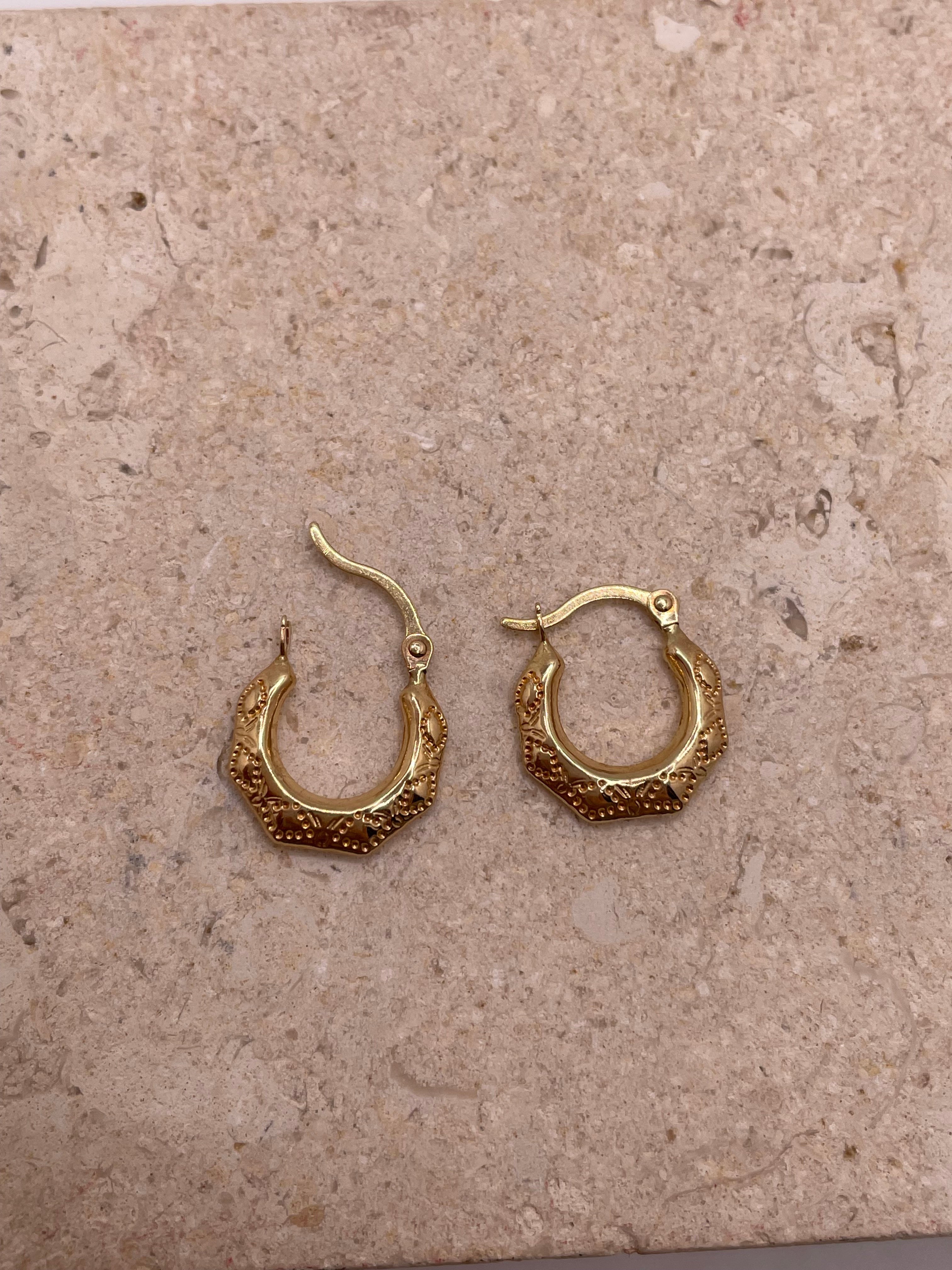 14K yellow gold 13mm fancy hollow hoop earrings with engraved details, lightweight design for toddlers or women.