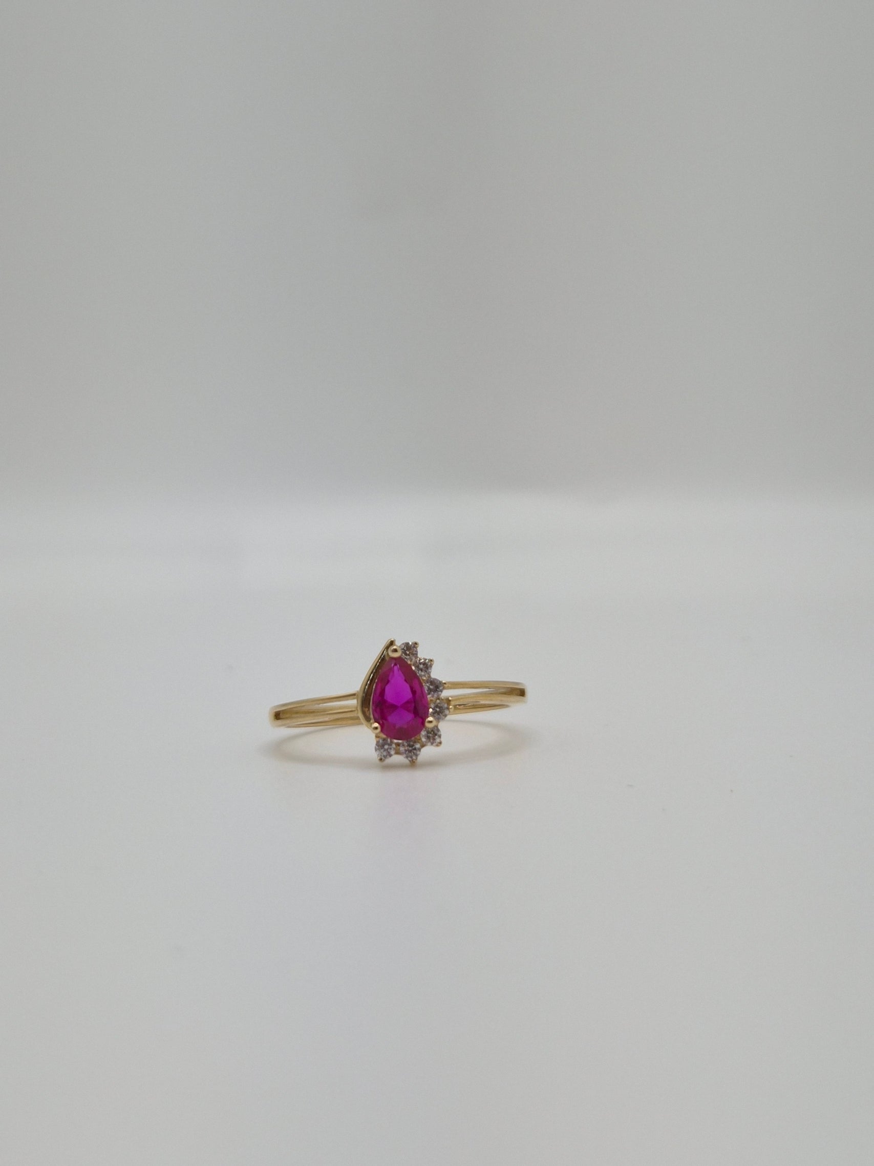 14k gold teardrop ring with cz accents (805)