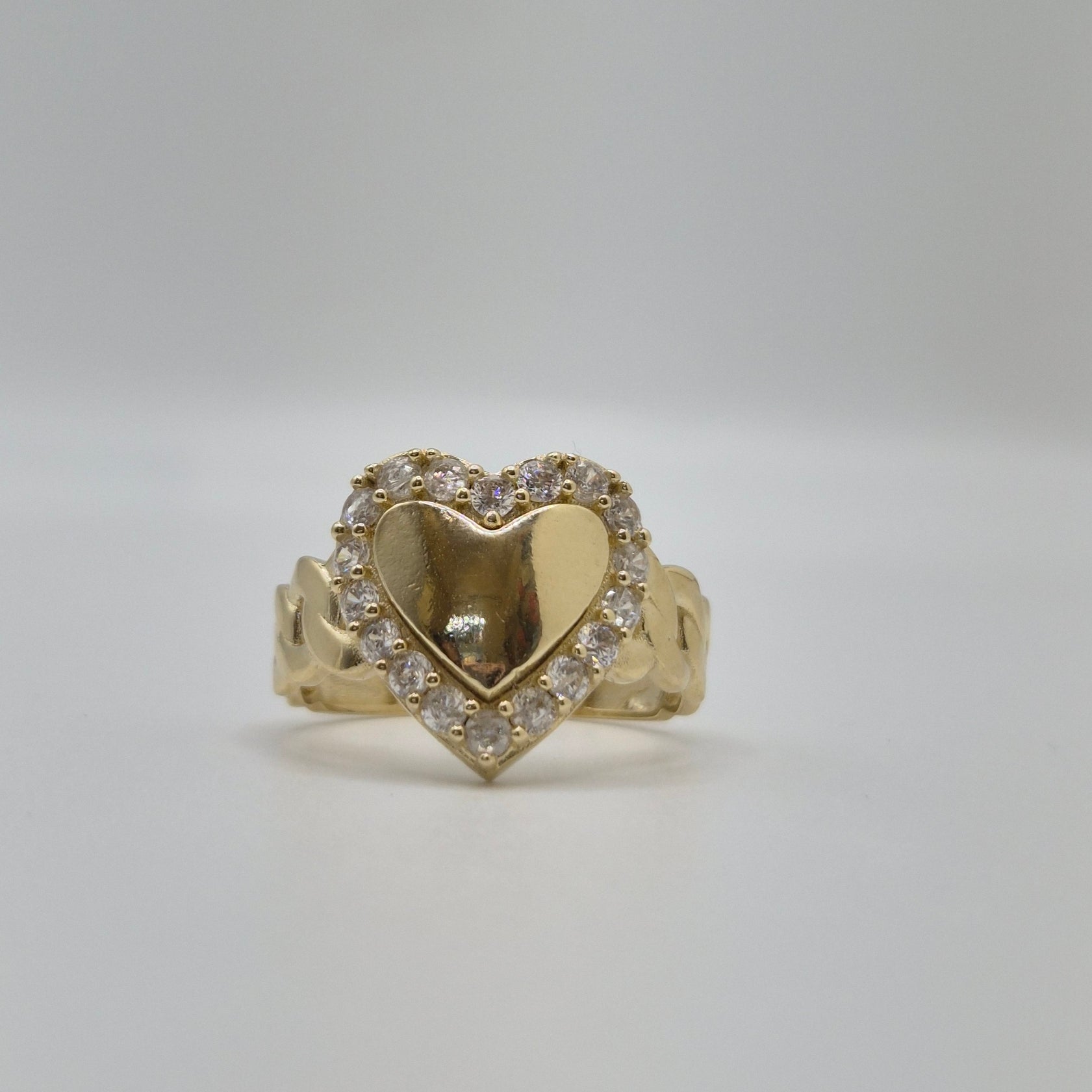 14K gold heart halo ring with CZ stone border and chain-link band design