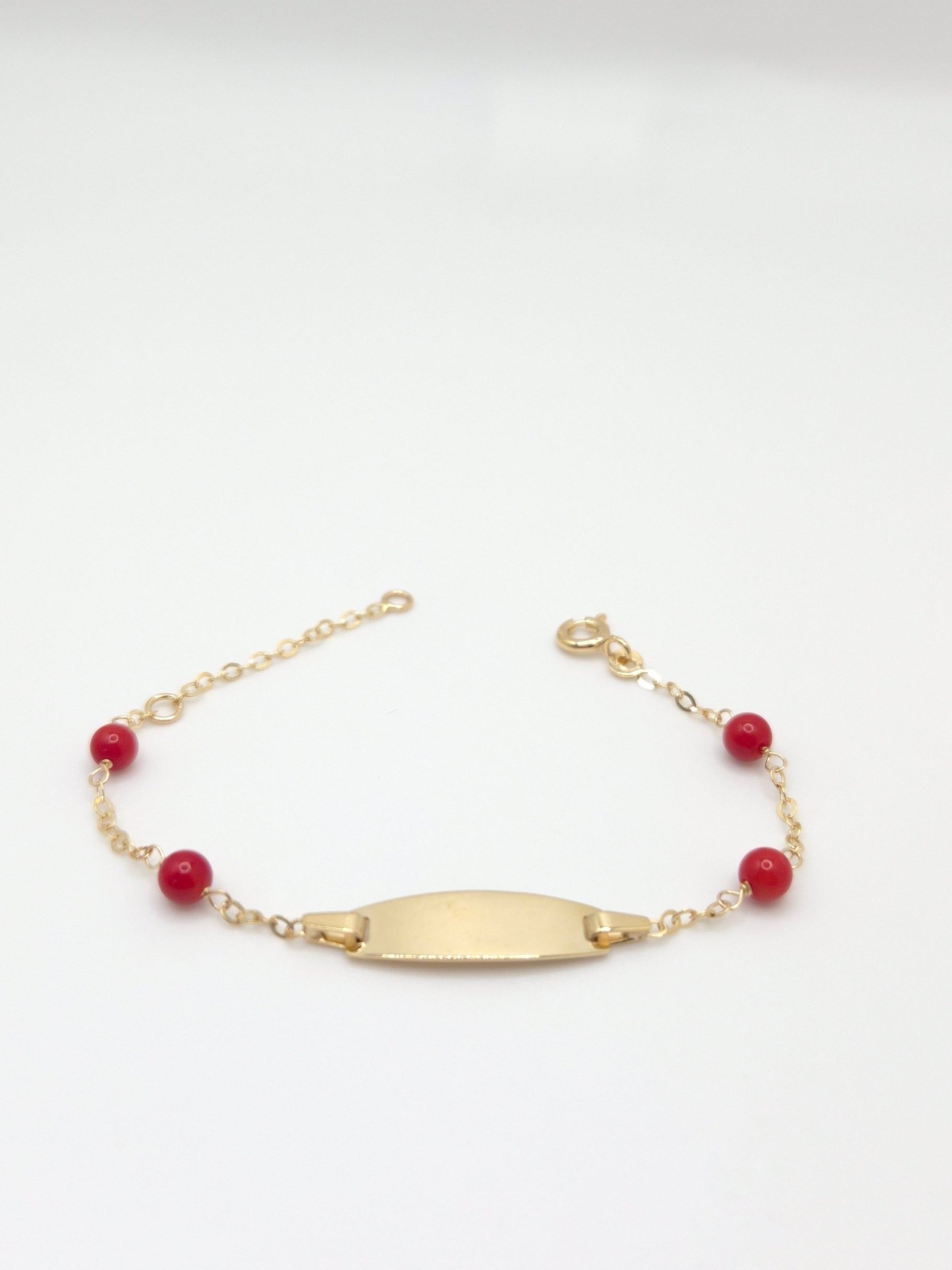 Pulsera de identificación de bebé con coral en oro amarillo de 14 quilates