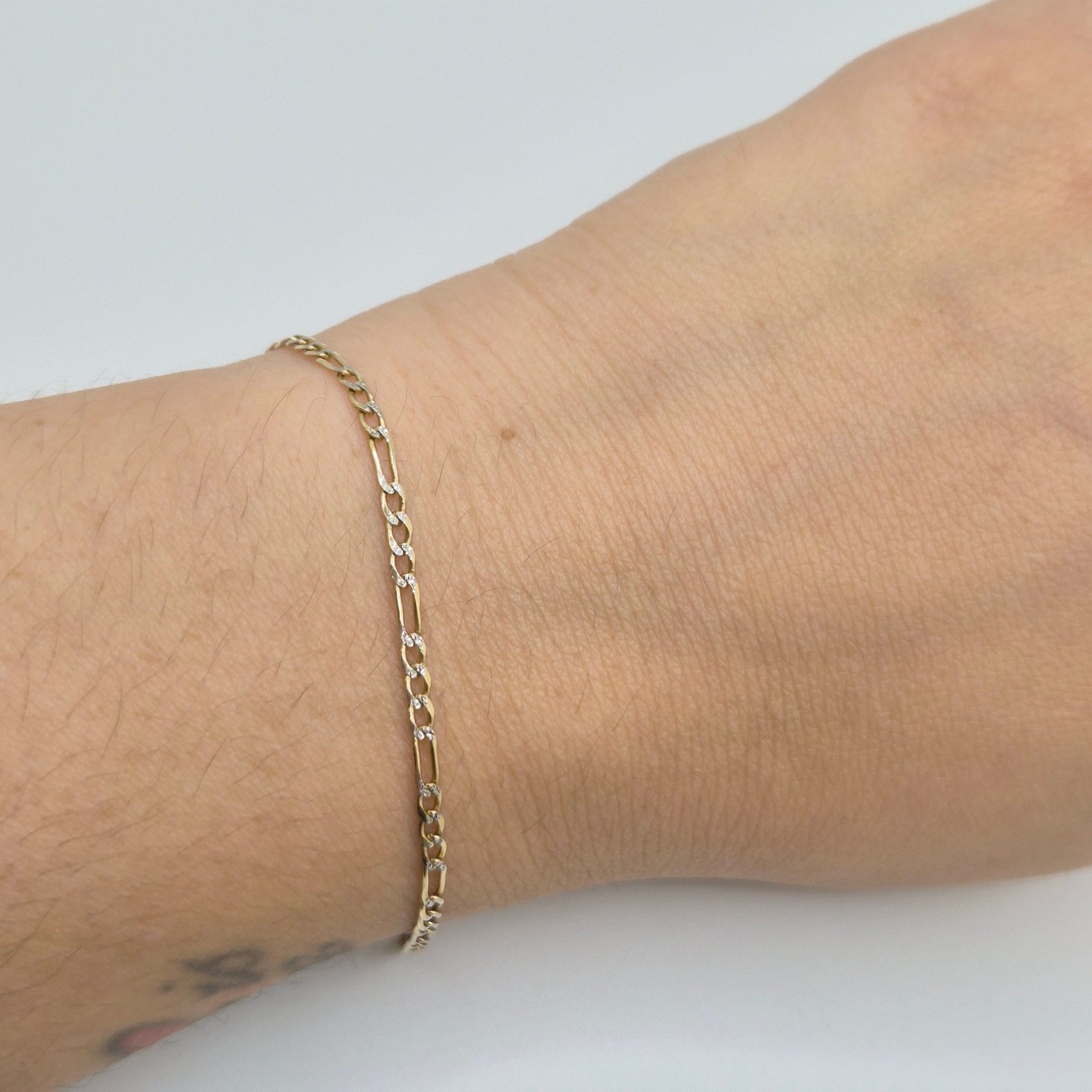 14k solid gold 2.7mm diamond cut figaro bracelet 7"