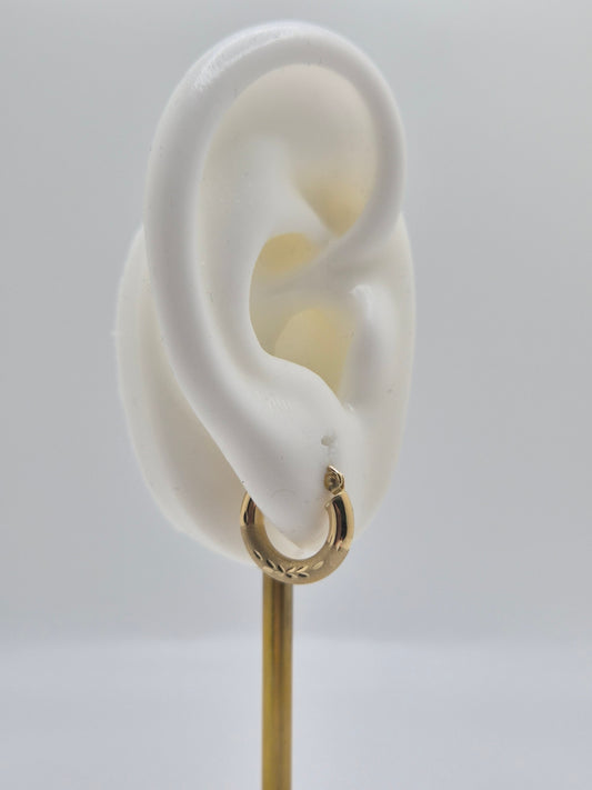 14K yellow gold mini hoop earrings with diamond-cut satin finish, 15mm lightweight everyday hoops.