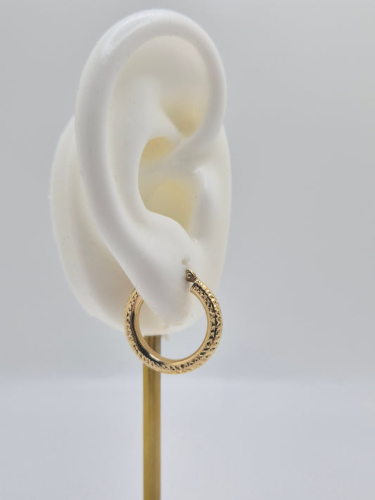14K yellow gold diamond-cut mini hoop earrings, 20mm round lightweight design with textured shine.
