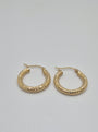 14K yellow gold diamond-cut mini hoop earrings, 20mm round lightweight design with textured shine.