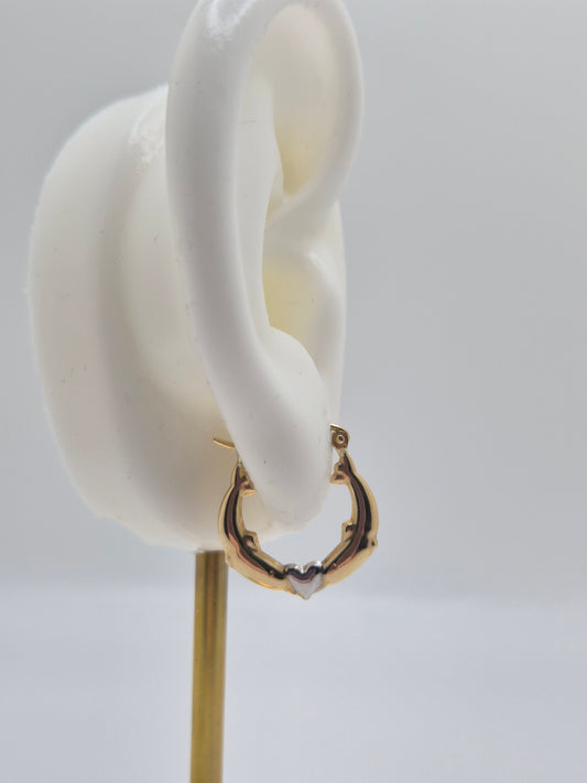 14K two-tone gold dolphin hoop earrings forming a heart design, 17mm lightweight hollow hoops.
