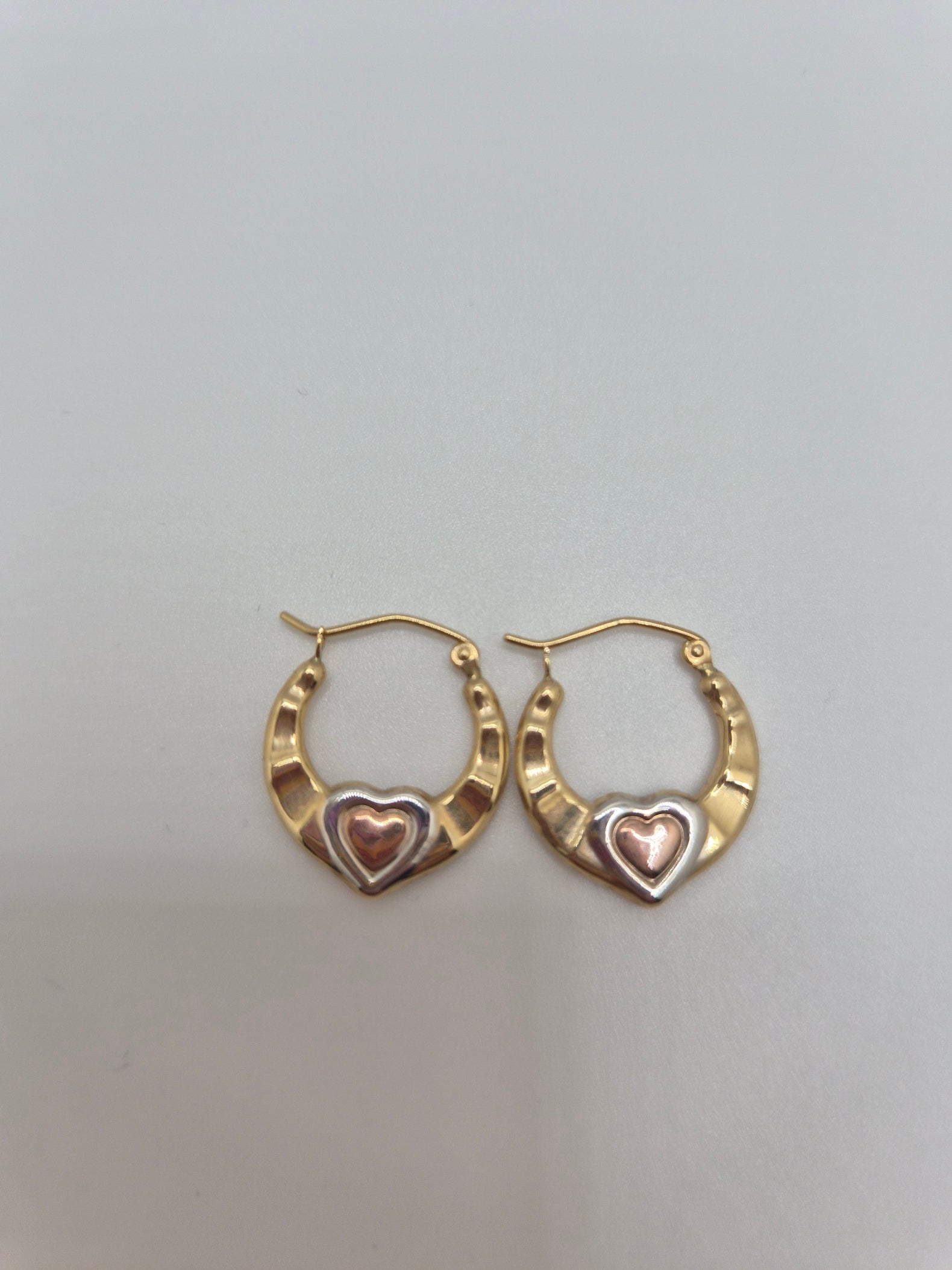 14K tri-color gold heart hoop earrings with rose gold center heart and white gold frame, 17mm hollow design.