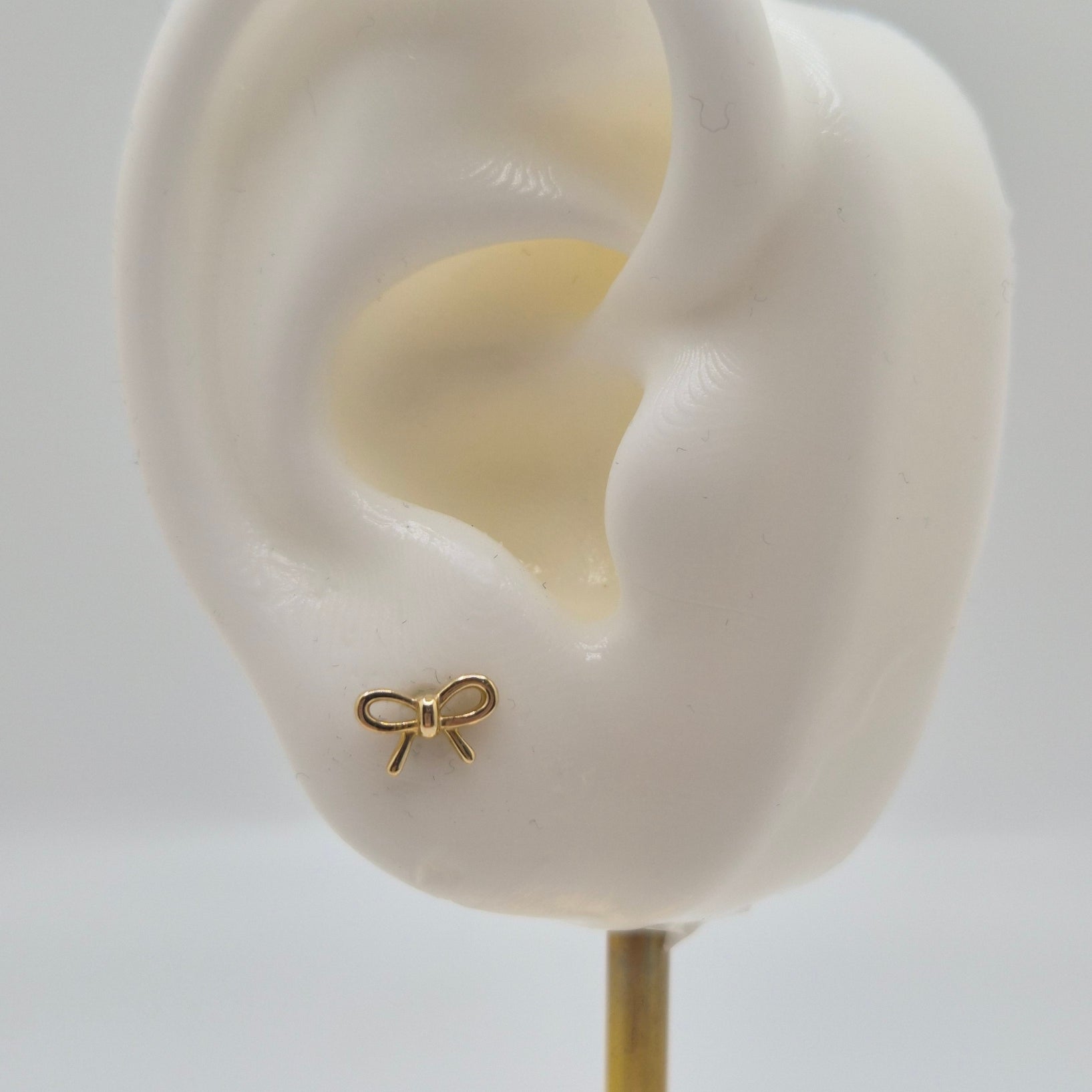 14k gold bow push back earrings