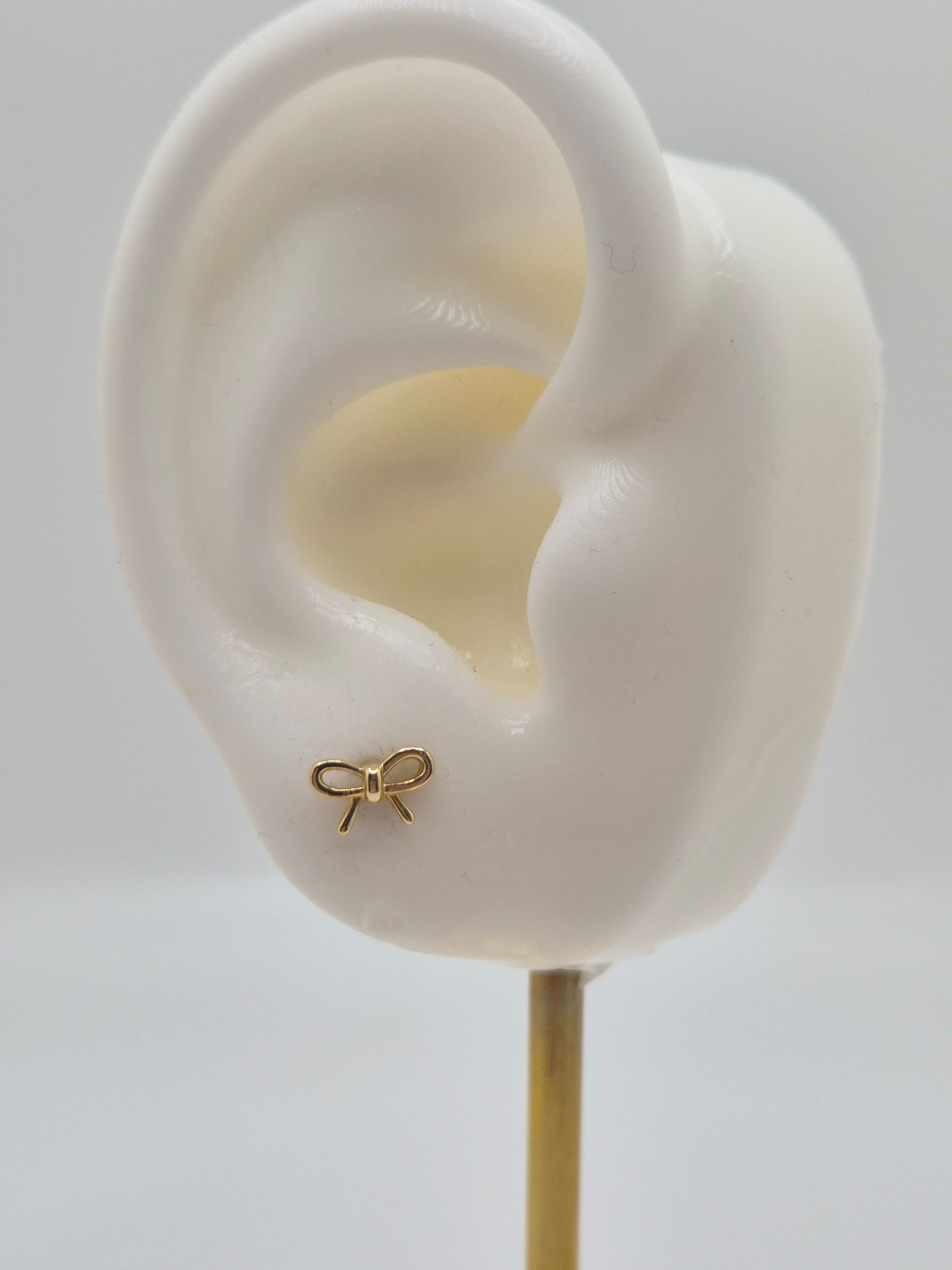 14k gold bow push back earrings