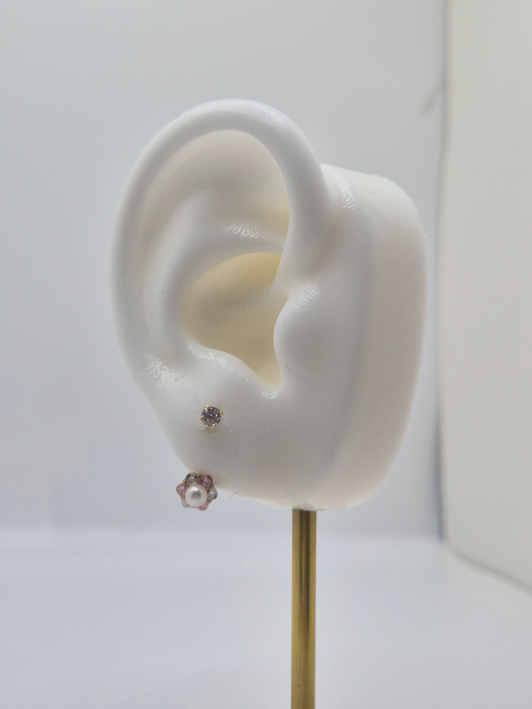 14k gold telephone earrings with cz flower