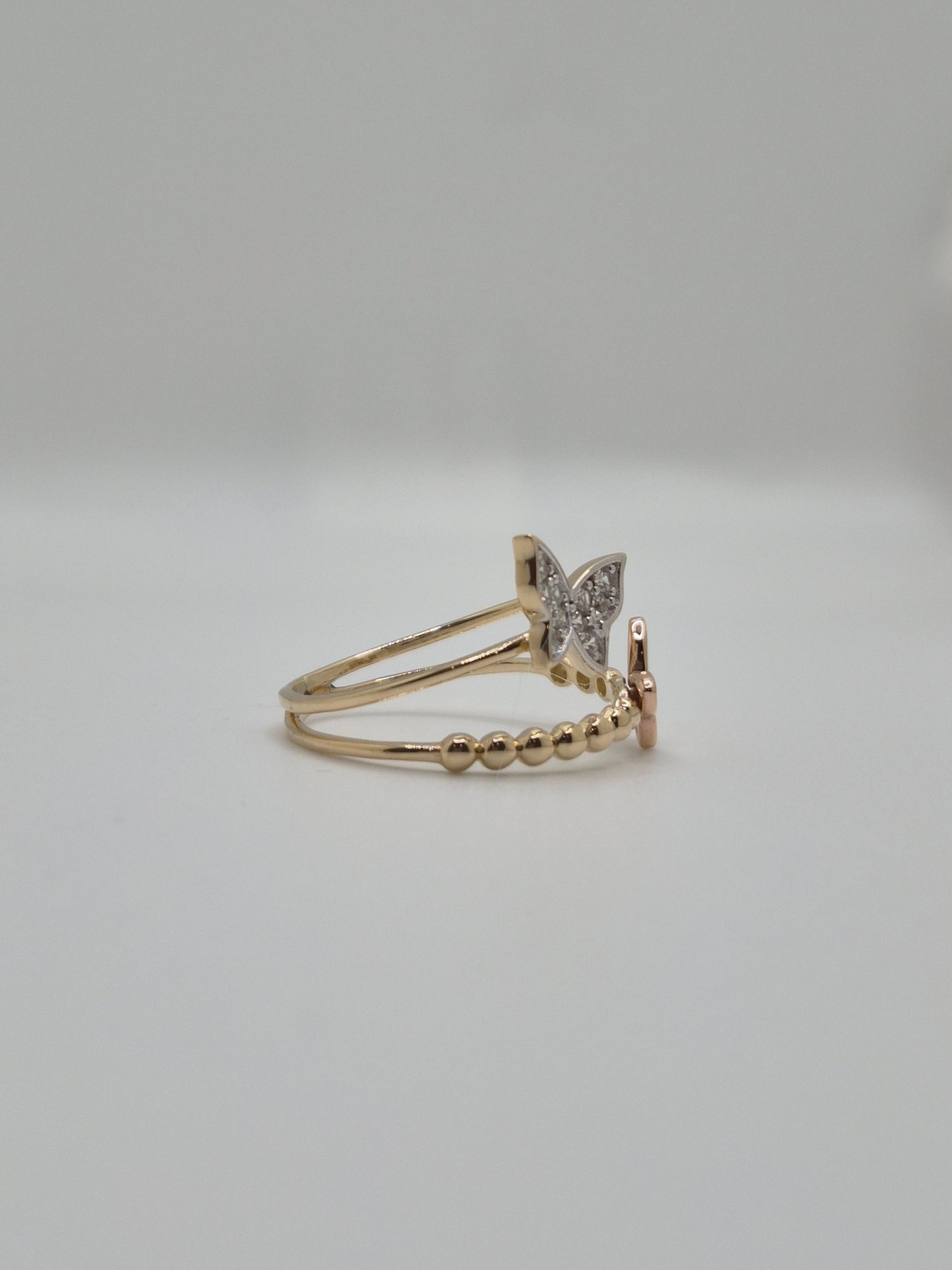 Anillo de mariposa doble con circonita amarilla en oro macizo de 14 quilates