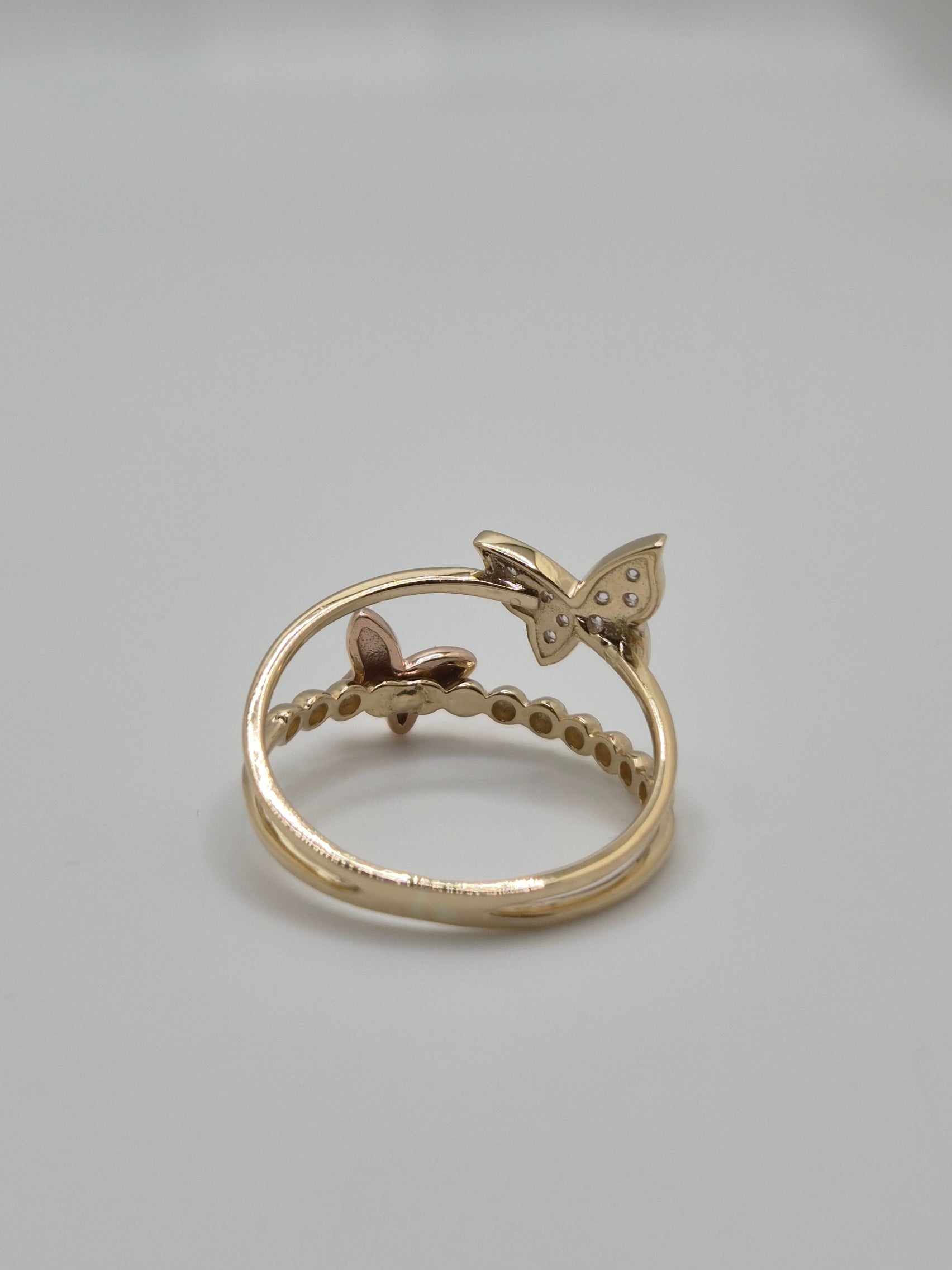 Anillo de mariposa doble con circonita amarilla en oro macizo de 14 quilates