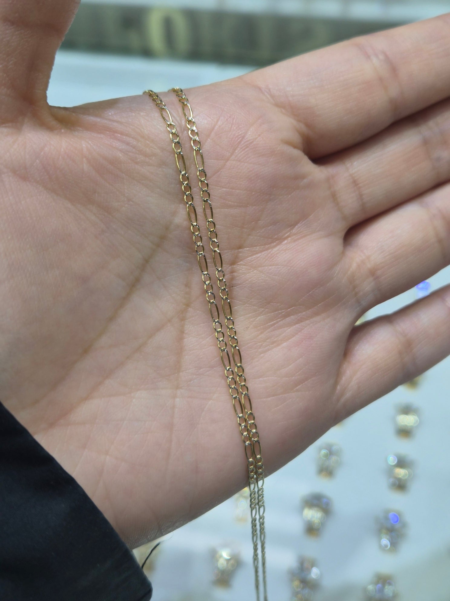 Cadena fígaro de oro macizo de 14 k con corte de diamante de 1,8 mm