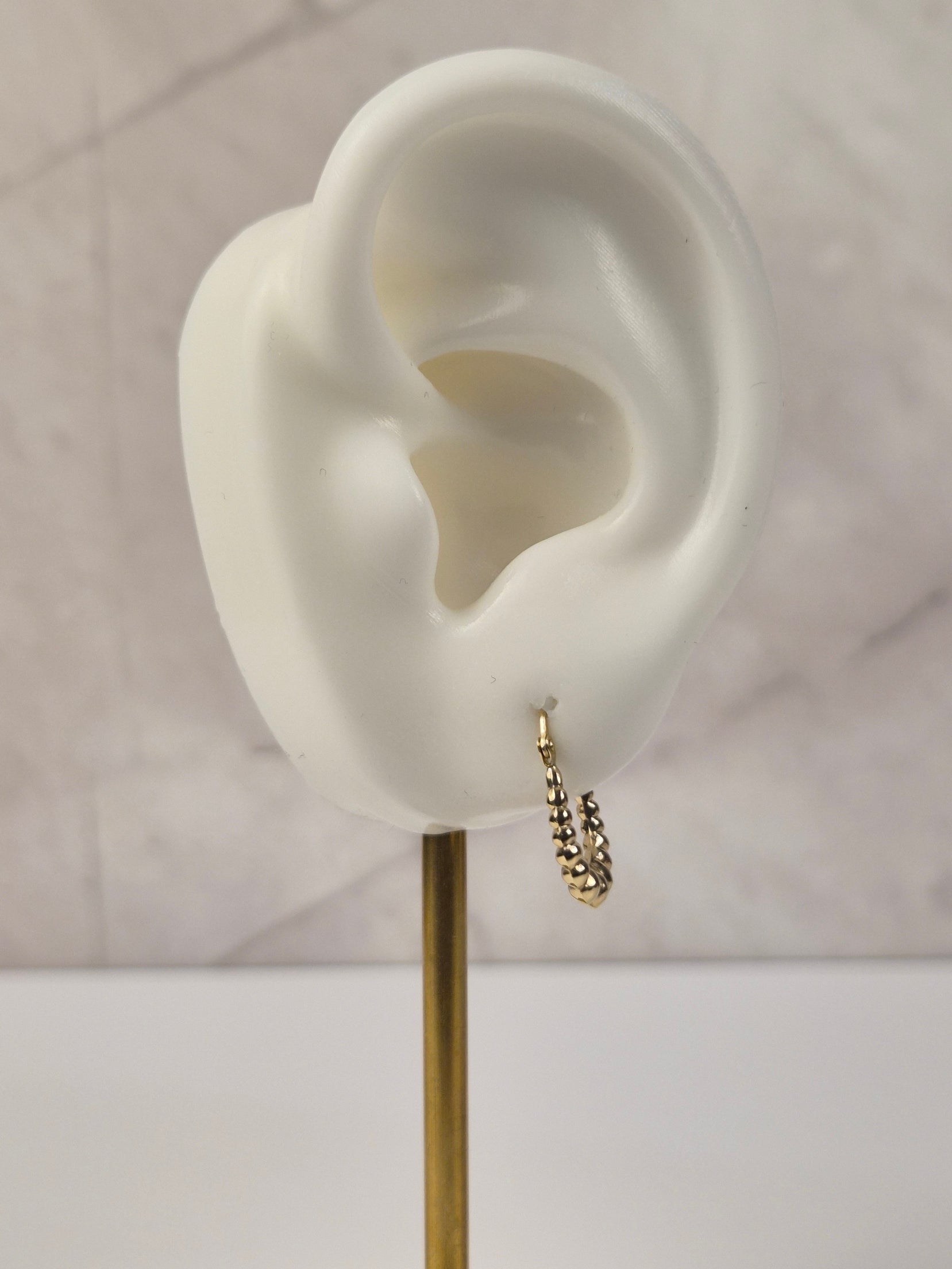 Tiny Golden Shrimp Hoops – 14K Gold