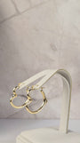 Aros Estrella Heart Hoops — Grandes (Aretes de corazón en ángulo de oro de 14 quilates)