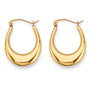 A stock photo showing a model wearing similar polished hoop earrings. The earrings should be visible from a side view, showcasing their size and style. The model should exude a trendy, modern look, matching the vibe of the earrings