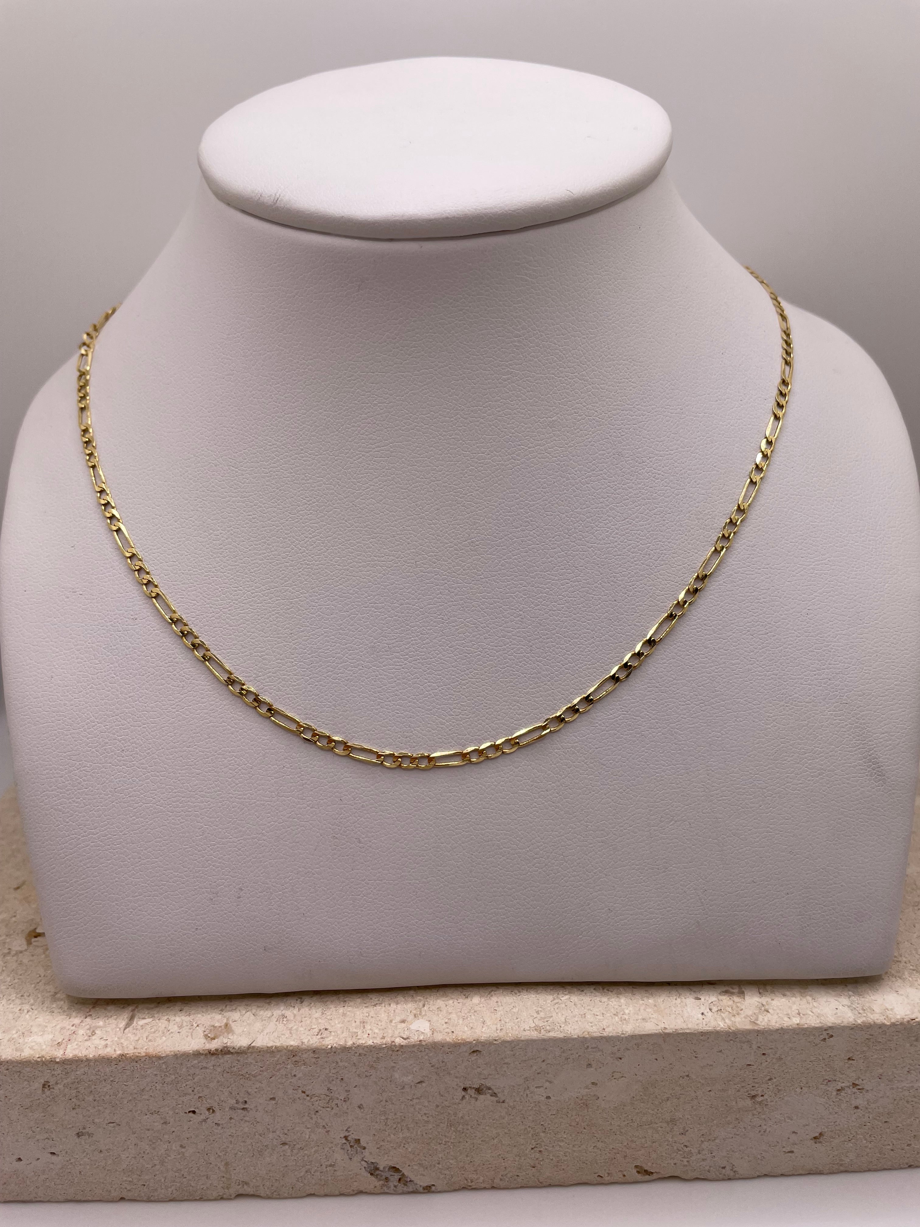 14k gold figaro chain enero
