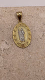 Close-up of 14K yellow gold oval San Judas pendant highlighting the white gold Saint Jude and fancy border details