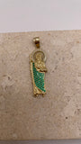 Close-up of 14K yellow gold San Judas pendant showcasing the CZ halo around Saint Jude’s head and green CZ body details