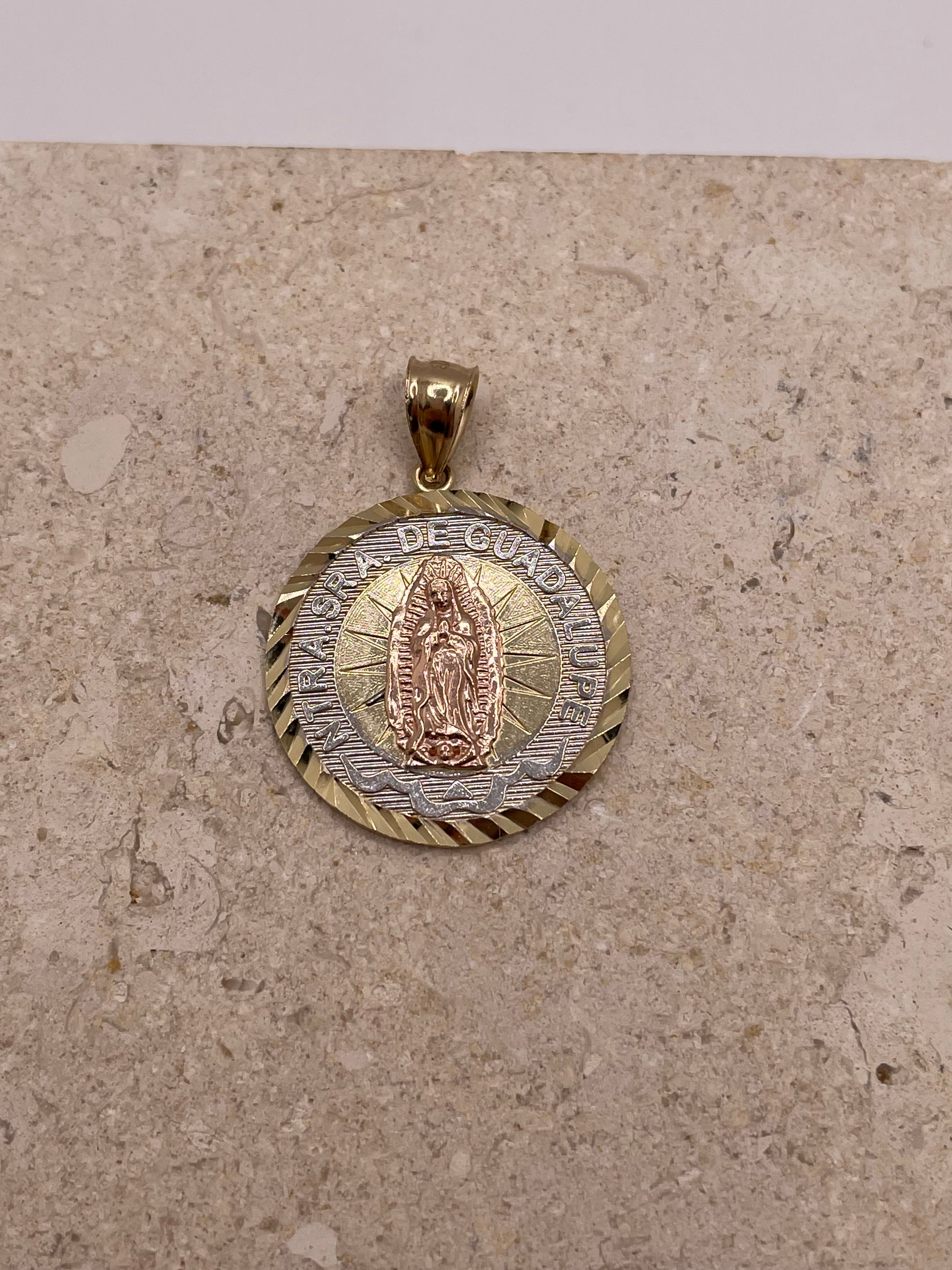 Close-up of 14K gold Nuestra Senora De Guadalupe pendant (25mm) with detailed rose gold Guadalupe and white gold border