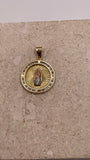Close-up of 14K yellow gold Virgencita pendant with CZ border and white gold and rose gold Virgin Mary at the cente
