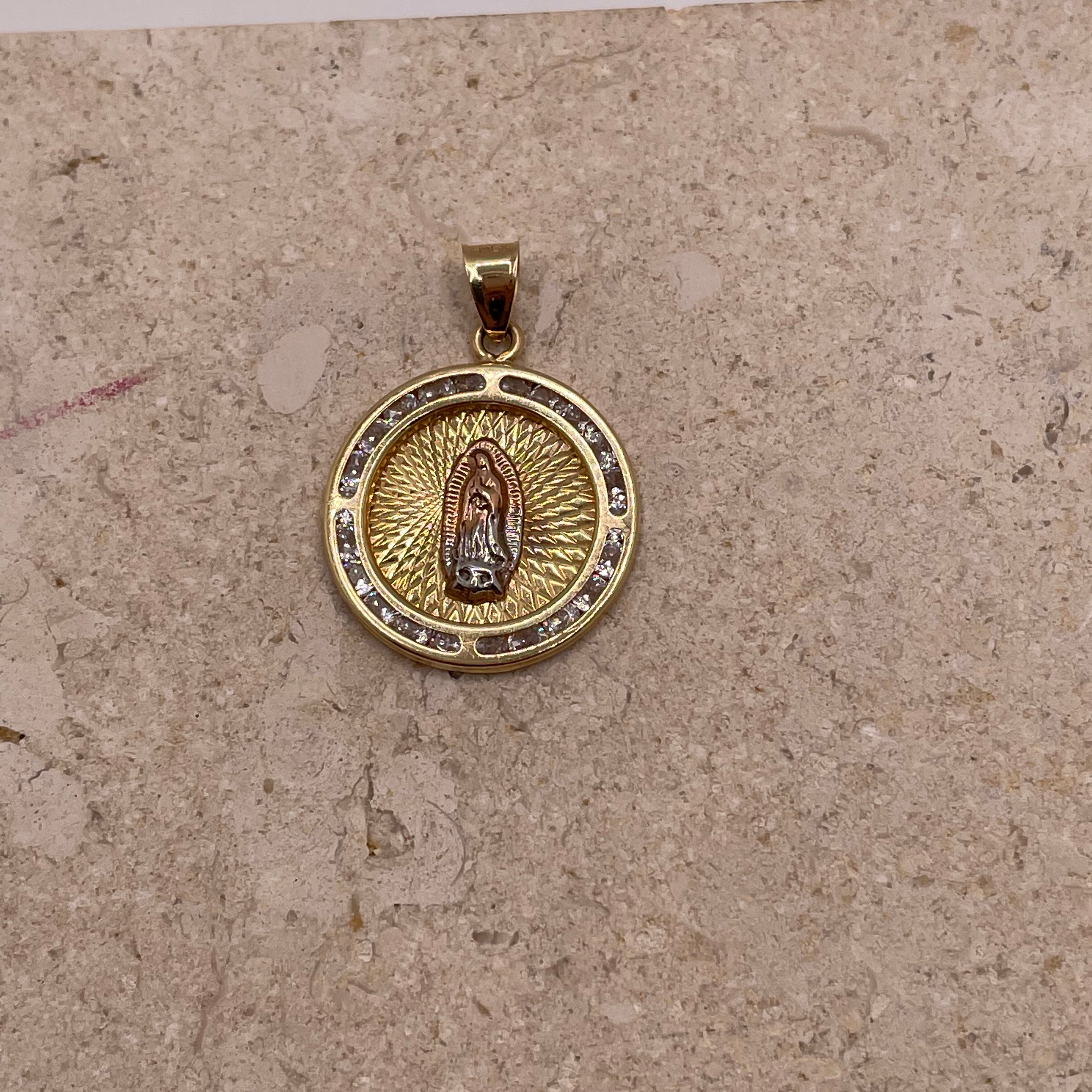 Close-up of 14K yellow gold Virgencita pendant with CZ border and white gold and rose gold Virgin Mary at the cente