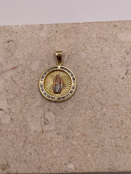 Close-up of 14K yellow gold Virgencita pendant with CZ border and white gold and rose gold Virgin Mary at the cente