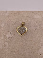 A close-up image showing the 14k gold "I Love You" heart pendant with the detailed cut-out design and sparkling cubic zirconia stones in the top heart. The delicate engraving of "I love you" is clearly visible on the gold heart