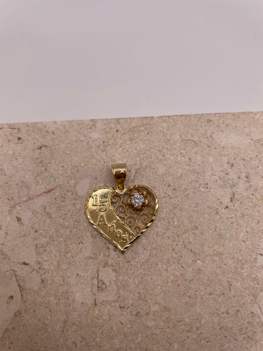 Close-up of 14k Gold '15' Quinceañera pendant with rose gold flower and CZ detail