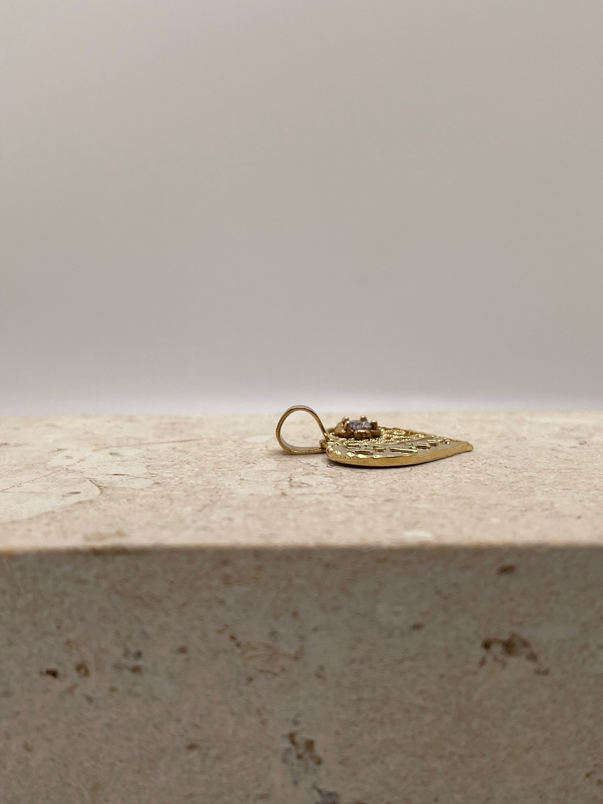 Side view of 14k Gold Quinceañera pendant showing fixed bail.