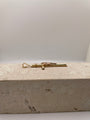 Side view of 14k Gold Tube Cross Crucifix showing fixed bail.