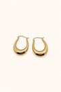 A close-up image showing the 14k gold polished hollow hoop earrings, highlighting their sleek and shiny surface. The hollow construction adds a light, airy feel to the design
