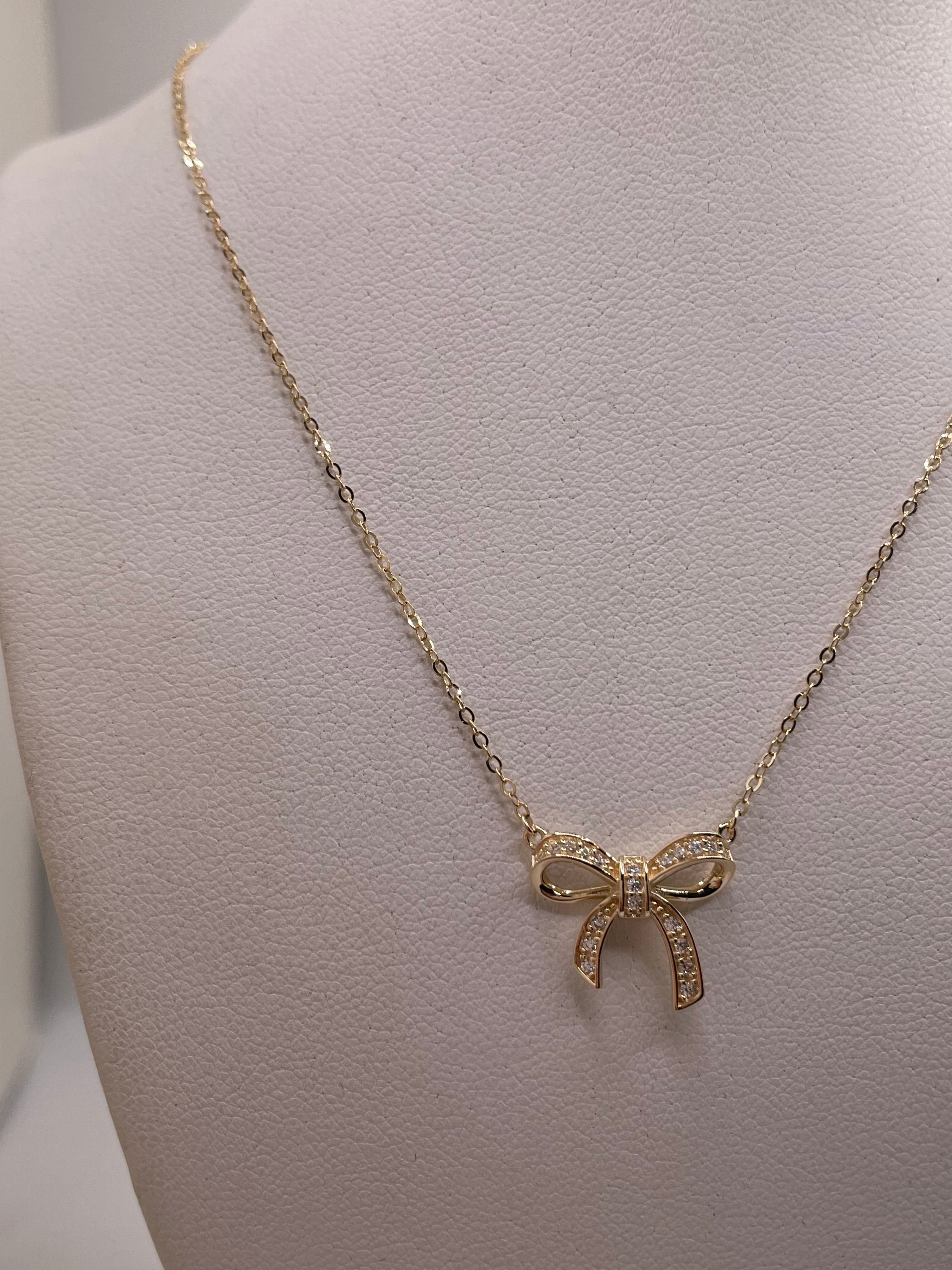 14k gold bow cz necklace