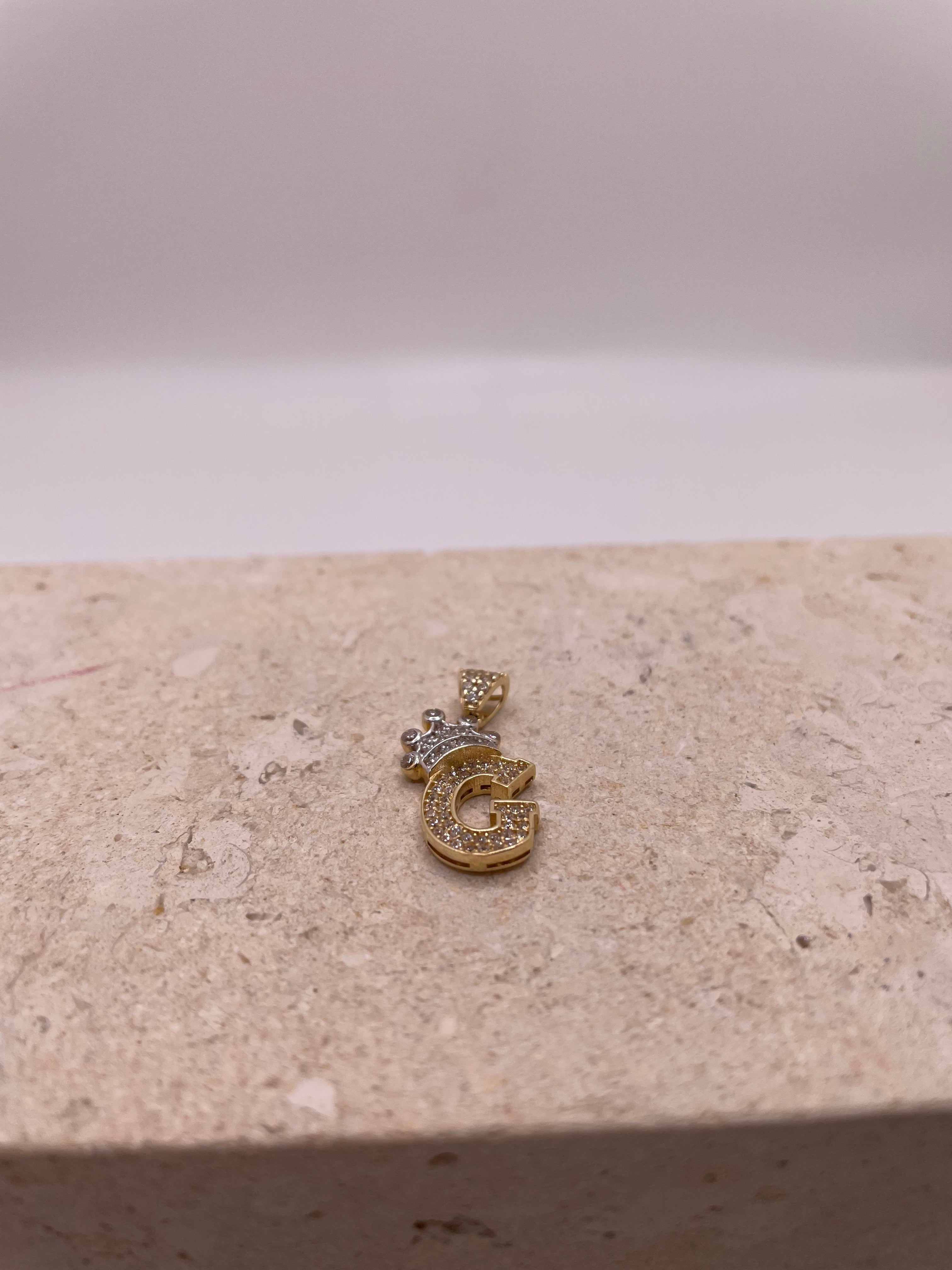 14k gold "g" initial pendant with crown and cz stones