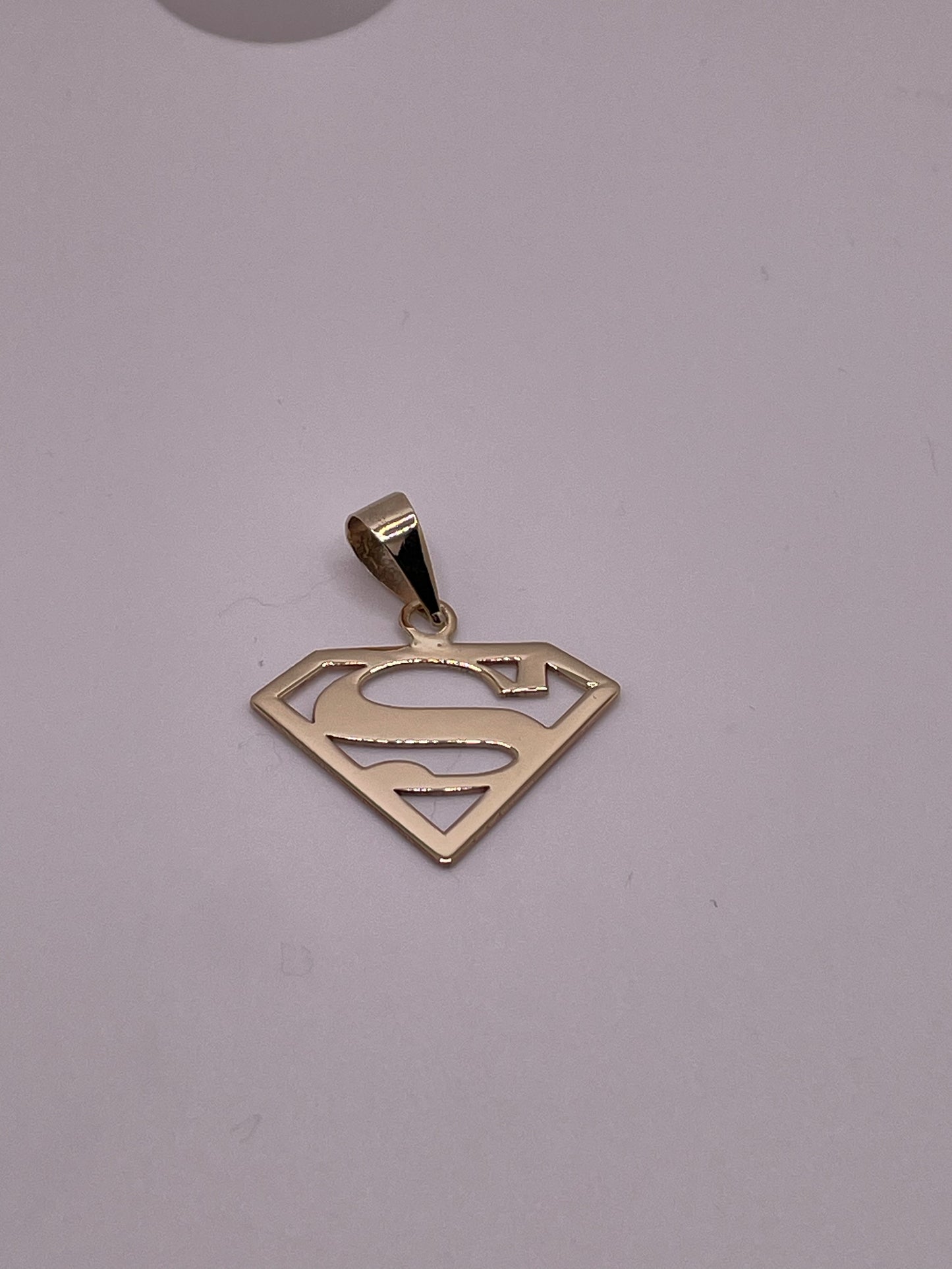 Milagros – Final Payment (10K Superman Pendant)