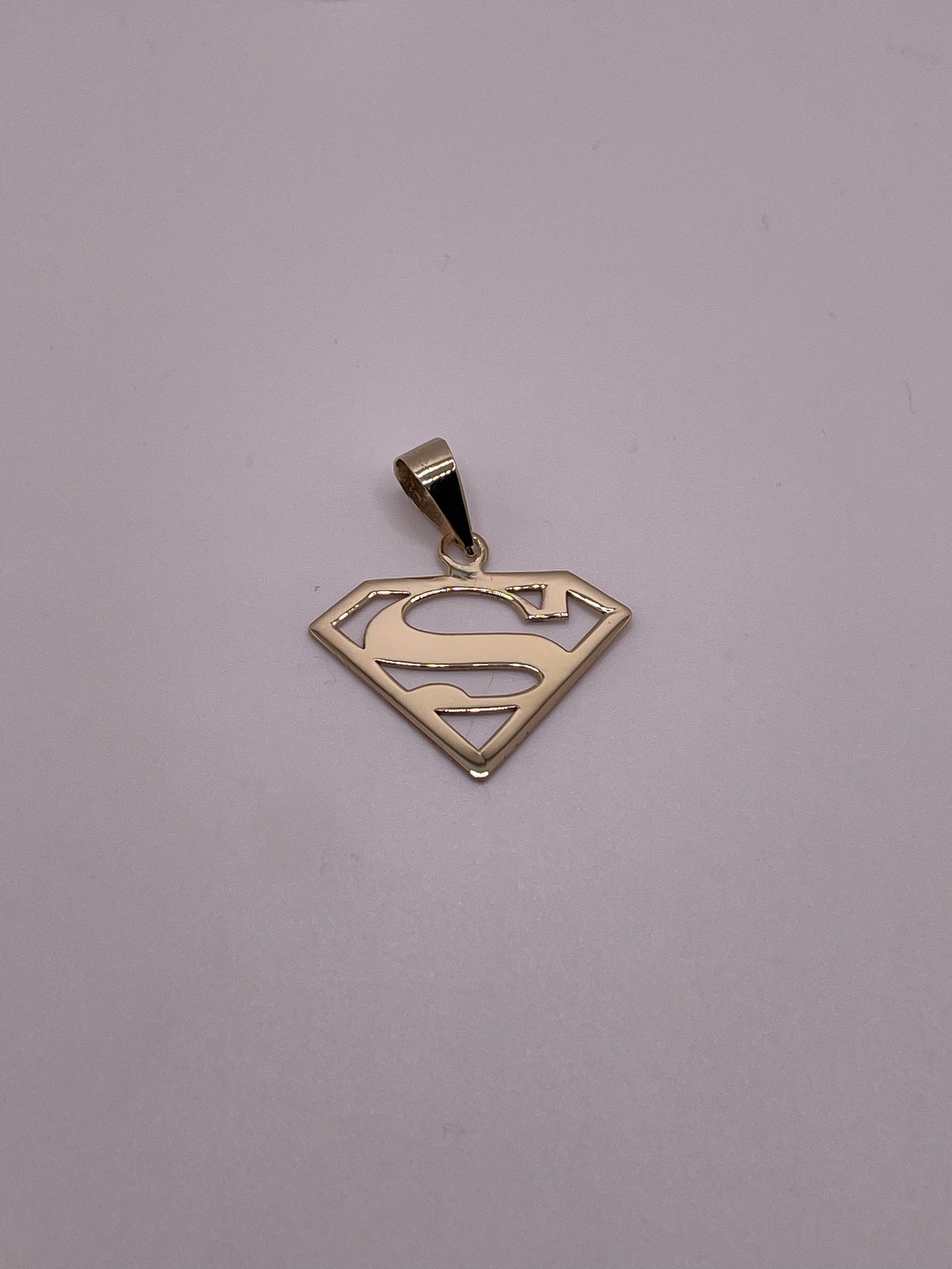 Milagros – Final Payment (10K Superman Pendant)