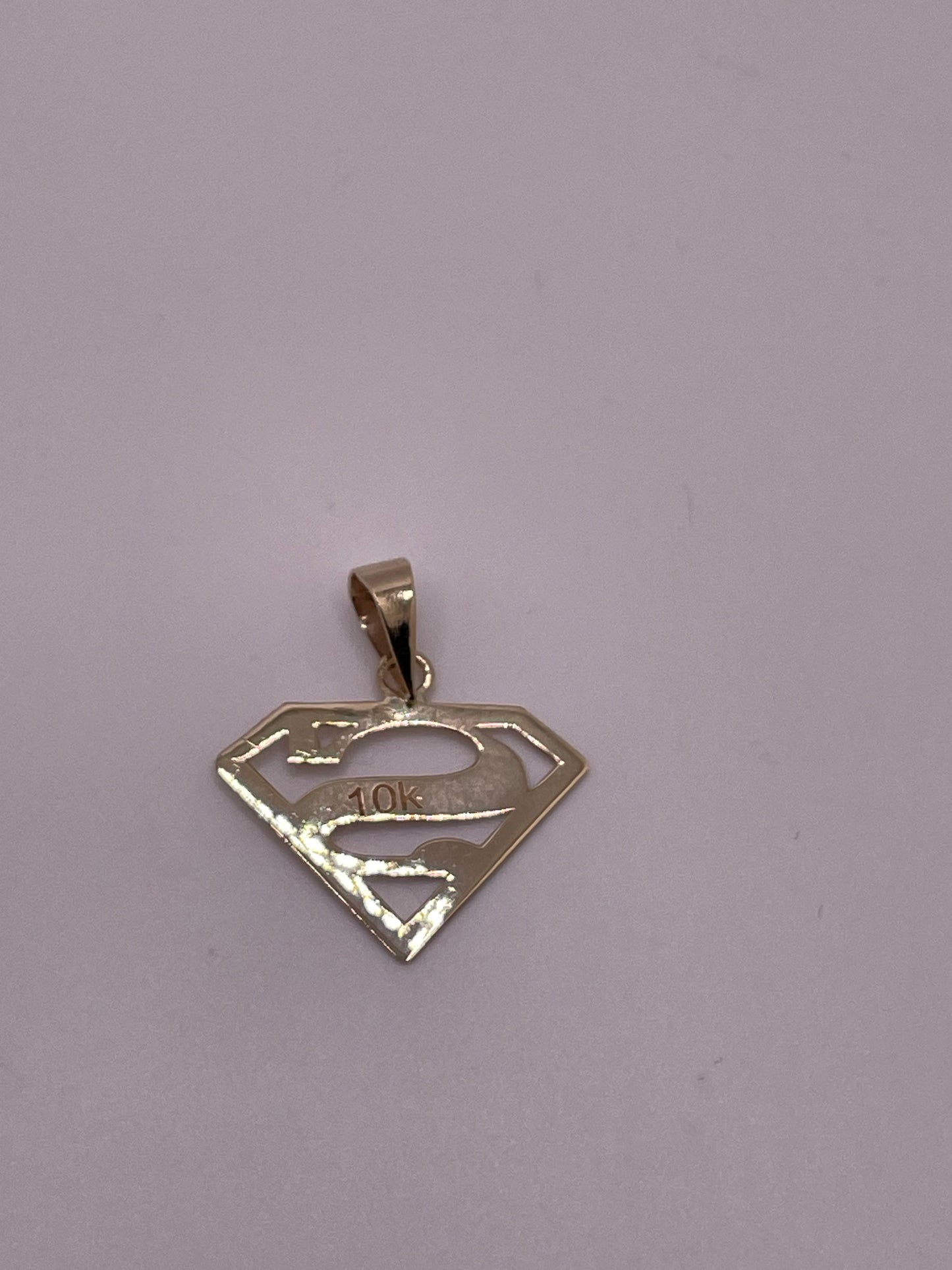 Milagros – Final Payment (10K Superman Pendant)