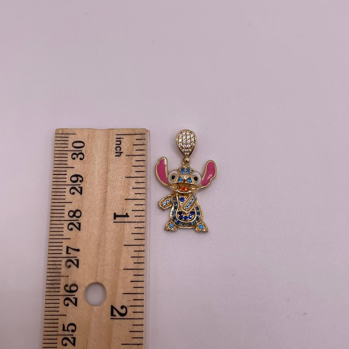 14K Gold Sparkly Stitch Pendant