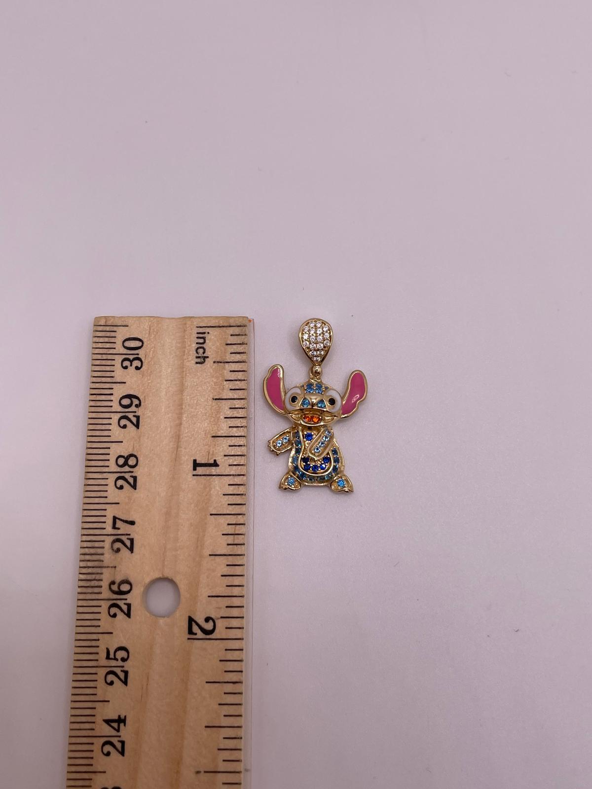 14K Gold Sparkly Stitch Pendant