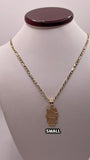 14k gold figaro chain with hello kitty pendant
